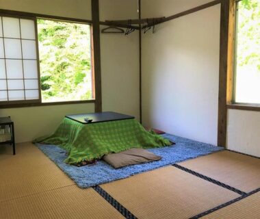 Tatami room with kotatsu and shoji screens at Ichinokurasou in Nagano, Chūbu, Japan