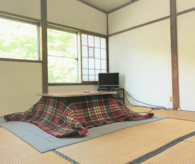 Tatami room with kotatsu and shoji windows at Ichinokurasou in Nagano, Chūbu