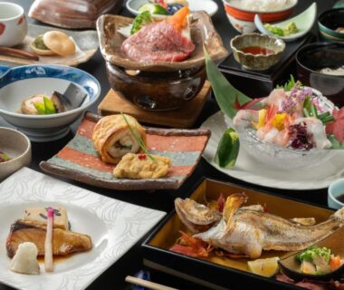 Assorted Japanese dishes on lacquer trays at Ikkyu -Seaside Hotel- Yamagata