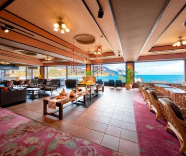 Spacious seaside lounge with seating and large windows, Inatori Akao Hotel, Shizuoka, Chūbu, Japan