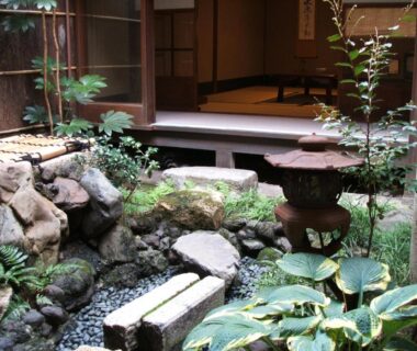 Stone lantern and stepping stones leading to a tatami room at Inn Kawashima, Kyoto, Kansai