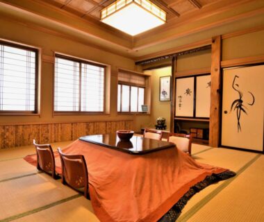 Traditional tatami room with kotatsu and shoji at Irorinoyado Ashina in Fukushima, Tōhoku