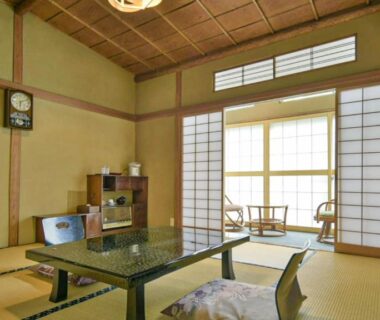 Tatami room with low table, shoji screens and balcony seating at Irorinoyado Ashina, Fukushima, Tōhoku