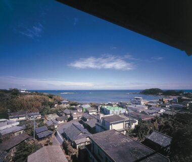 View over coastal rooftops toward the sea from Ise-Shima Ohtaya Healing Stay, Mie prefecture