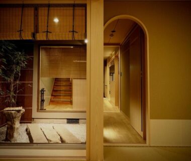 Wooden corridor and courtyard at Ishibekoji Muan Kyoto with tatami and shoji screens
