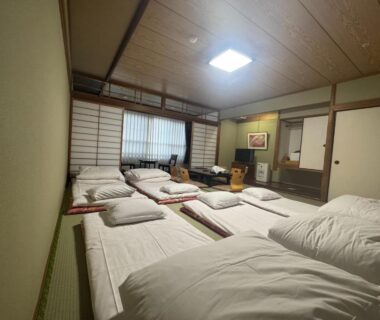 Traditional tatami room with futon bedding at Ishicho ryokan in Kyoto, Kansai, Japan