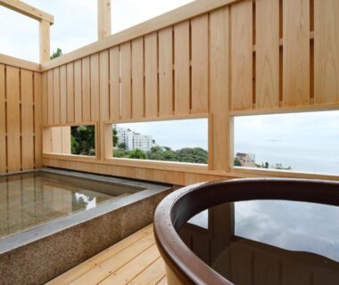 Stone and wooden tubs on terrace at Ishinoya Atami, Shizuoka