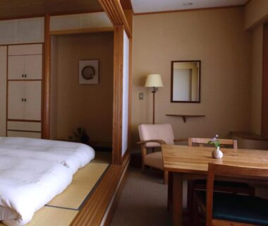 Traditional tatami room with futon and low table at Itamuro Onsen Daikokuya, Tochigi, Kantō, Japan