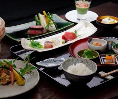 Assorted traditional Japanese meal with rice and small dishes at Itamuro Onsen Daikokuya, Tochigi