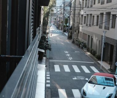 View down quiet residential street from balcony at Ito Ryokan in Tokyo, Kantō
