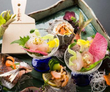 Assorted sashimi and small dishes with fresh wasabi at Ito Ryokuyu, Shizuoka