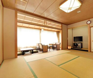 Spacious tatami room with low table and seating at Itoen Hotel Shiobara in Tochigi, Kantō, Japan