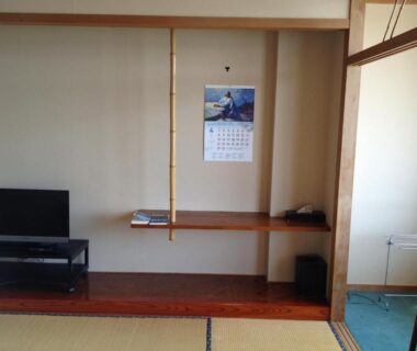 Tatami room with alcove, low TV and sliding door at Iyashinoyado Rodem in Iwate Tōhoku