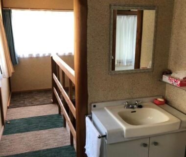 Sink and mirror in corridor at Izu Hokkawa Seaside Guesthouse, Shizuoka
