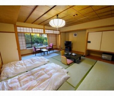 Traditional tatami room with futons at Izu Nagaoka Kinjokan, Shizuoka, Chūbu, Japan