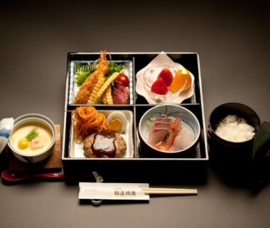 Lacquered bento with tempura, sashimi, chawanmushi and rice at Jizokan Matsuya Ryokan Nagano