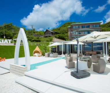 Outdoor pool and umbrella-shaded seating at Jukaitei in Kyoto, Japan