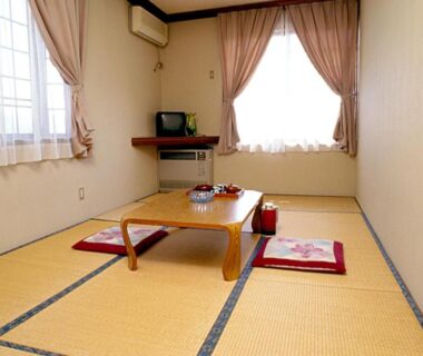 Tatami room with low table and cushions at Juvankan, Nagano, Chūbu, Japan