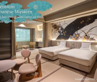 Twin beds, tatami-style flooring, seating area and shoji window at KAMENOI HOTEL Arima, Hyōgo