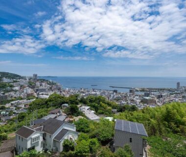 Panoramic seaside town view from hillside at KAMENOI HOTEL Atami Annex Shizuoka