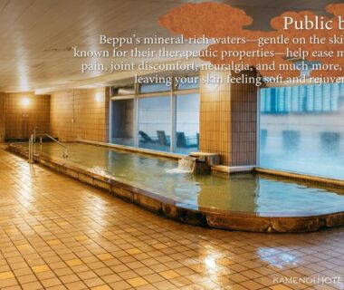 Tiled indoor communal onsen with soaking pool and windows at KAMENOI HOTEL Beppu, Ōita