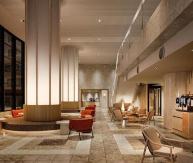 High-ceiling ryokan lobby with seating and tiled flooring at KAMENOI HOTEL Fuji in Yamanashi, Chūbu, Japan