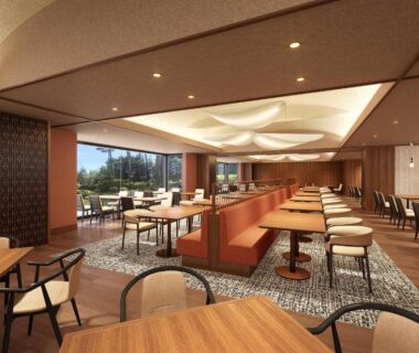 Spacious dining lounge with wooden tables and floor-to-ceiling windows at KAMENOI HOTEL Fuji, Yamanashi, Chūbu, Japan