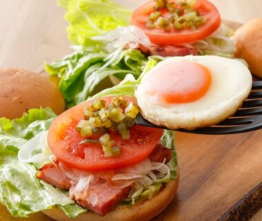 Breakfast sandwiches with fried egg, tomato, lettuce and bacon at KAMENOI HOTEL Fuji in Yamanashi