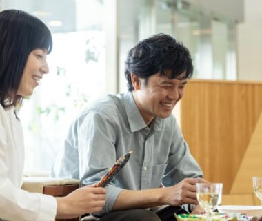 Two guests enjoying drinks at a dining table KAMENOI HOTEL Ichinoseki Iwate Tōhoku
