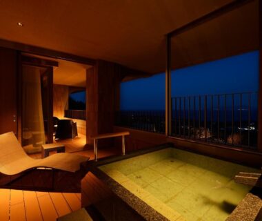In-room wooden bath and lounge, KAMENOI HOTEL Izukogen, Shizuoka, night view