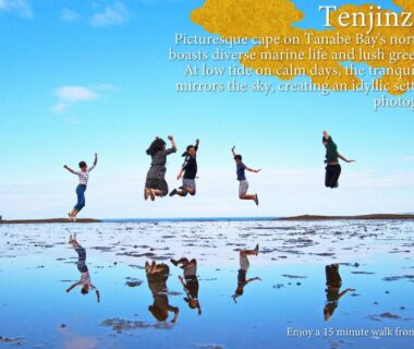 People jumping on reflective tidal flats near KAMENOI HOTEL Kii-Tanabe, Wakayama, Kansai