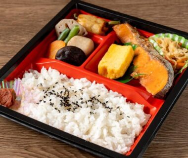 Bento box with rice and side dishes at KAMENOI HOTEL Okunikko in Tochigi, Kantō, Japan