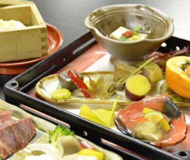 Assorted Japanese dishes on lacquer tray at Kadonobo Ryokan, Hyōgo, Kansai, Japan