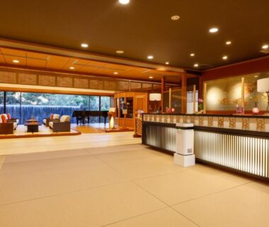Spacious tatami lobby with reception desk and seating overlooking a garden at Kaikatei Hanagozen Kyoto