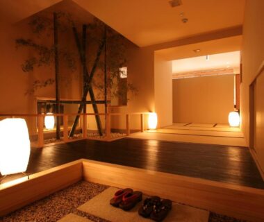Raised tatami platform with lanterns, wooden flooring and slippers at Kakimotoya, Nara