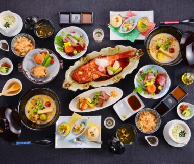 Assorted traditional Japanese dishes and grilled fish at Kameyama Onsen Hotel, Chiba, Kantō