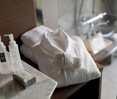 Folded bathrobe, toiletries and soap by bathtub at Kanaya Hotel Kinugawa in Tochigi, Kantō, Japan