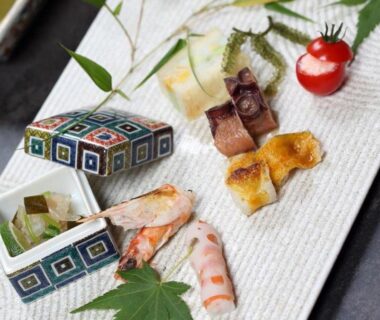 Assorted Japanese dishes with shrimp, grilled items and pickles at Kanazawa Yuwaku Onsen Kokarian, Ishikawa Japan