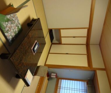 Low table, zabuton cushion, shoji window and fusuma doors in Kanemidori tatami room, Gunma