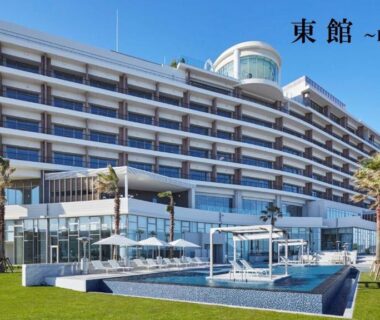 Multi-story hotel building with pool and palm trees, Karatsu Seaside Hotel, Saga, Kyūshū, Japan