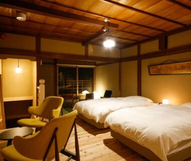 Warm wooden-ceiling twin bedroom with shoji screens and seating, Kariya Ryokan Q, Hyogo, Kansai