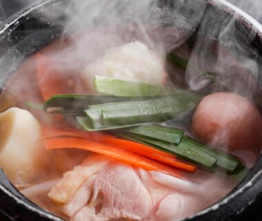Steaming nabe hot pot with vegetables and meat at Kawaguchiya Kinosaki Riverside Hotel, Hyogo, Kansai