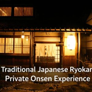 Traditional wooden ryokan entrance lit at night with shoji windows and stone path, Kazeya in Gifu Chūbu