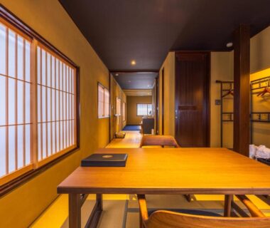 Tatami dining area with low wooden table and shoji screens at Kinnotake Saryo Kanagawa Japan