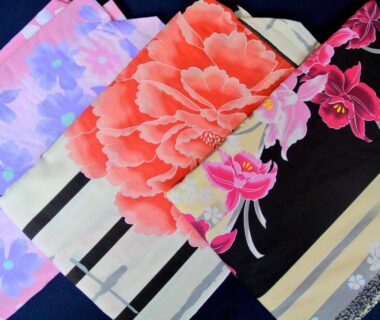 Folded floral yukata obi pieces at Kinnotake Tonosawa ryokan in Kanagawa, Kantō, Japan