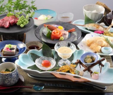 Assorted Japanese dishes on ceramic plates at Kinseikan Seseragi, Gunma