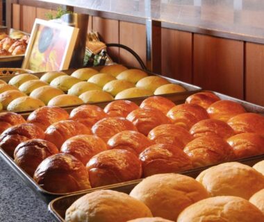 Tray of assorted breakfast rolls on counter at Kinugawa Plaza Hotel in Tochigi, Kantō, Japan