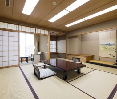 Traditional tatami room with low table, zabuton cushions, shoji screens and tokonoma in Kinzan, Hyōgo, Kansai