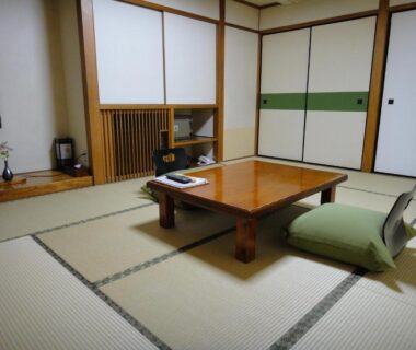 Traditional tatami room with low wooden table, floor cushions, sliding fusuma and tokonoma at Kisoya, Gifu, Chūbu