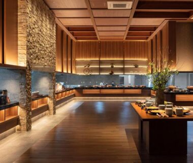 Spacious buffet dining hall with warm wood interiors at Kitakobushi Shiretoko Hotel & Resort in Hokkaidō